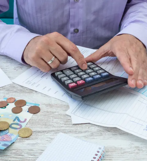 young-man-calculating-family-accounts 1